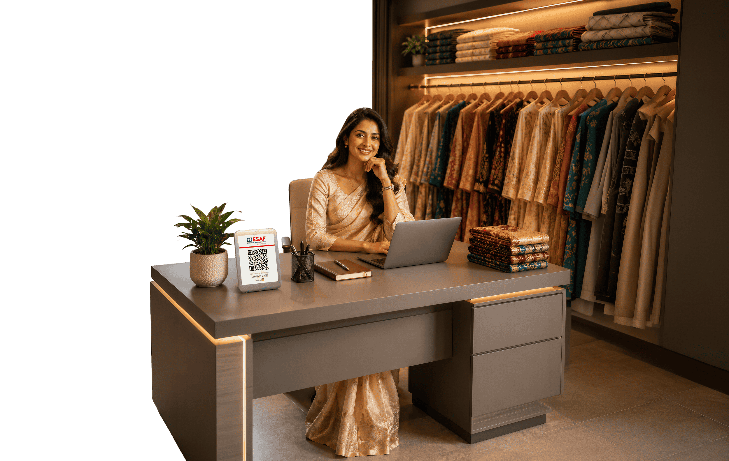 Woman at boutique desk with ESAF Merchant QR device